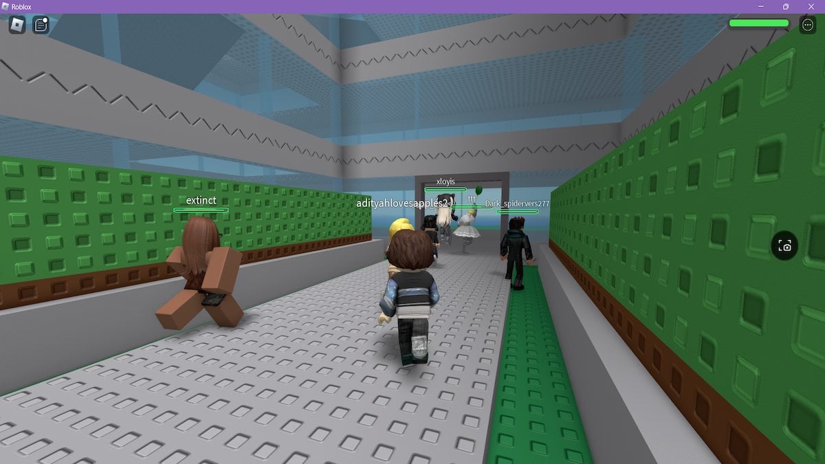 Several avatars running inside a building in Natural Disaster Survival on Roblox